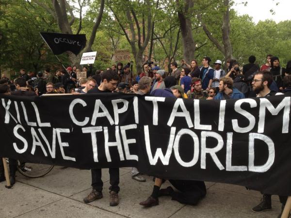 Marchers stop near Chrystie and E. Houston.