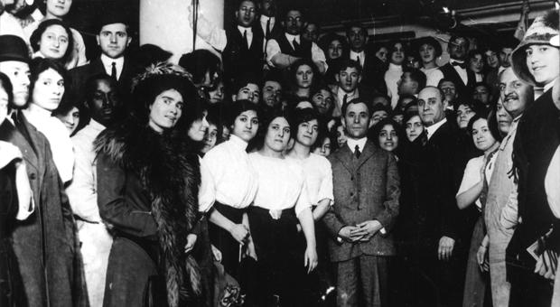 Triangle Waist Company owners Isaac Harris (front row near center with hands folded) and Max Blanck (in a dark suit to the right of Harris) with a group, probably workers at one of their factories.