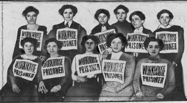 Women who were arrested on the picket lines and sent to Blackwell’s Island wear “Workhouse Prisoner” signs claiming their service with pride, and were cheered by other strikers and supporters.