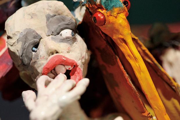 A still from 'Open Window,' one of Djurberg's videos at the New Museum. Her claymation characters explore the basest aspects of violence and gluttony.