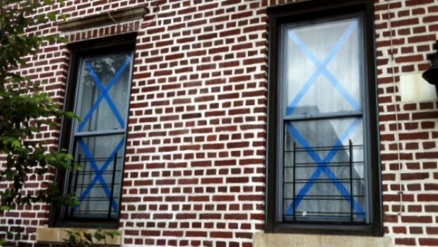 Some of the windows at Lincoln and St. Charles in Crown Heights, Brooklyn are taped up for Irene. Some of the windows at Lincoln and St. Charles in Crown Heights, Brooklyn are taped up for Irene.