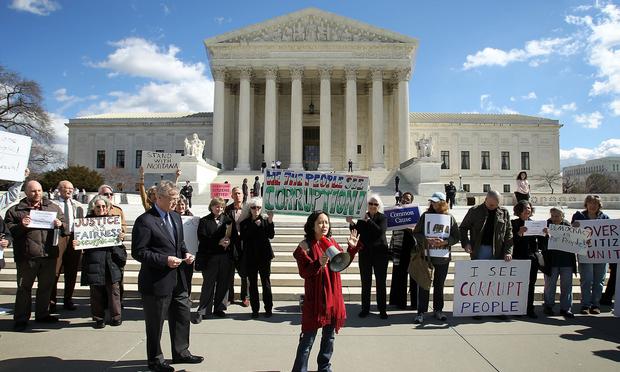 Activists urge the Supreme Court to overturn Citizens United v. Federal Election Commission in 2012. Activists at U.S. Supreme Court