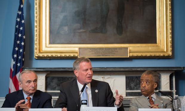 Mayor Bill de Blasio hosts a roundtable on police-community relations with Commissioner Bill Bratton, Reverend Al Sharpton, and others in City Hall's Blue Room, in C