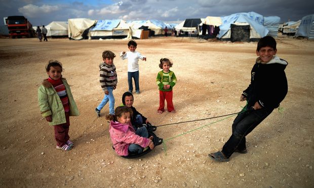 Children play in a Syrian refugee camp in Mafraq, Jordan Syria, refugee camps, humanitarian crisis, jordan
