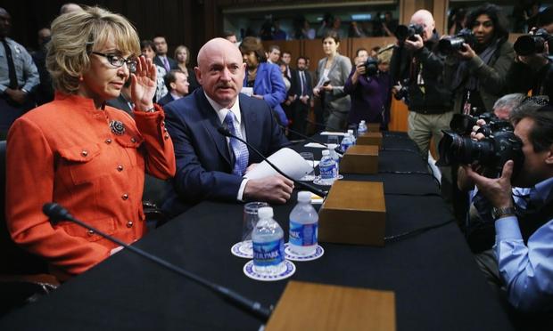 Shooting victim and former U.S. representative Gabby Giffords arrives for a Senate Judiciary Committee hearing about gun control on January 30, 2013.