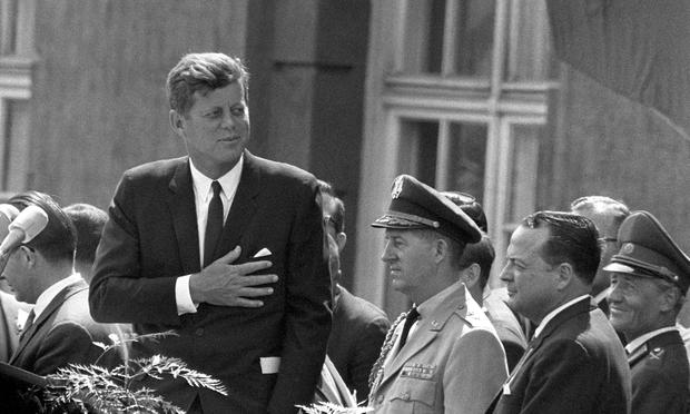 Picture taken on June 26, 1963 shows then US President John F Kennedy (L) giving a speech at the Schoeneberg city hall in Berlin.