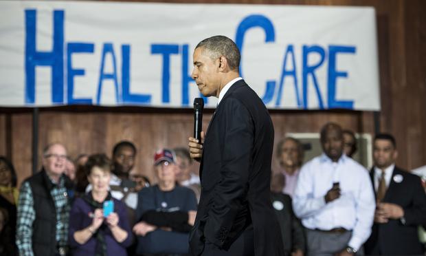 President Barack Obama pauses while speaking at Temple Emanu-El November 6, 2013 in Dallas, Texas. Obama spoke about the Affordable Care Act amid technical problems.