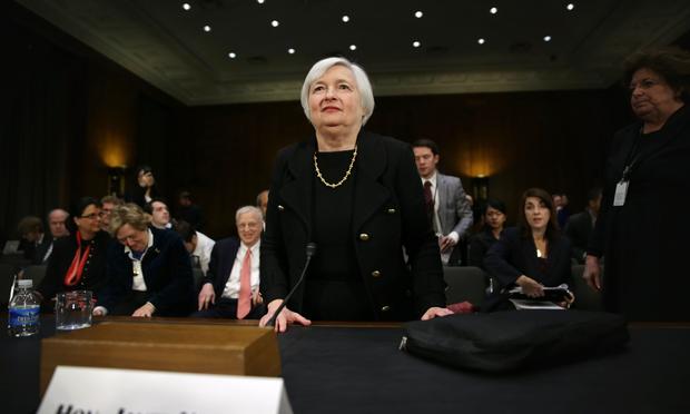 Nominee for the Federal Reserve Board Chairman Janet Yellen leaves after her confirmation hearing November 14, 2013 on Capitol Hill in Washington, DC.