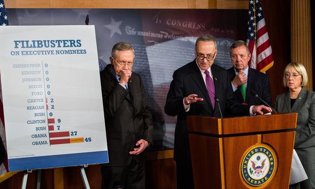 Senate Majority Leader Harry Reid (D-NV), Sen. Chuck Schumer (D-NY), Sen. Dick Durbin (D-IL), and Sen. Patty Murray (D-WA) hold a news conference on Capitol Hill, November 21, 2013 in Washington, DC.