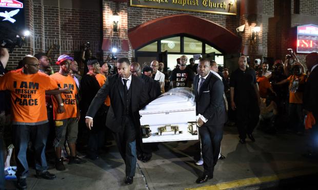 Pallbearers carry out the casket of Eric Garner after the funeral service at the Bethel Baptist Church in Brooklyn