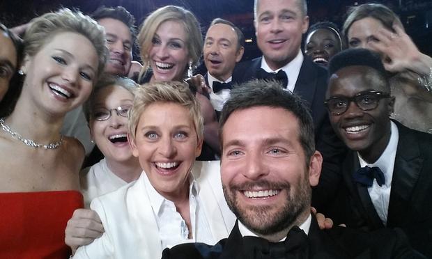 Ellen DeGeneres takes a selfie during a heavily mocked Oscars ceremony.