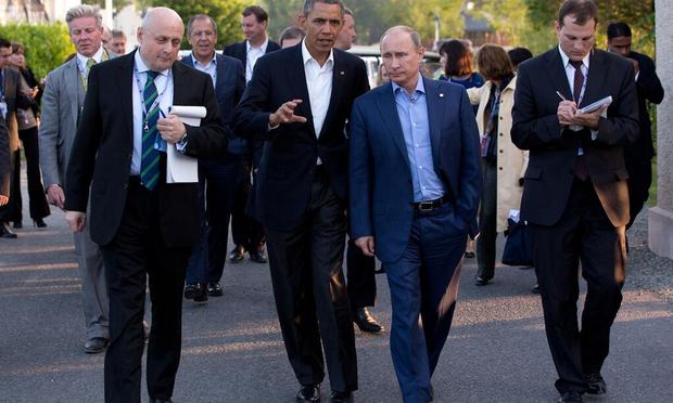 United States President Barack Obama and Russian President Vladimir Putin walk to the G8 Summit dinner following their bilateral meeting in Ireland on 17 June 2013.