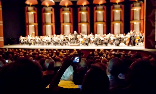 Detroit Symphony Orchestra patrons take photos at a concert in Florida Detroit Symphony Orchestra patrons take photos at a concert in Florida