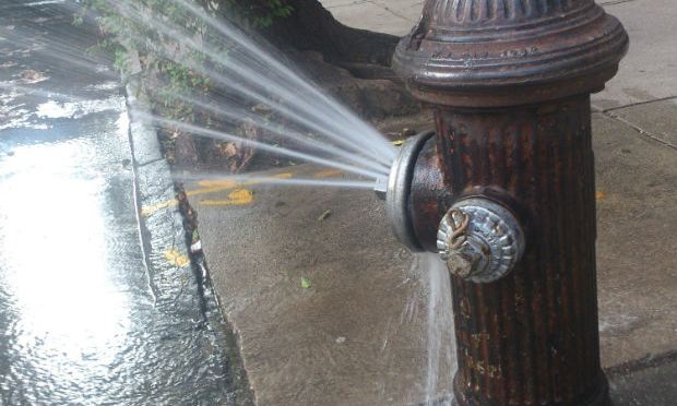 Hydrant with sprinkler cap, West 92nd Street between Columbus and Central Park West in July