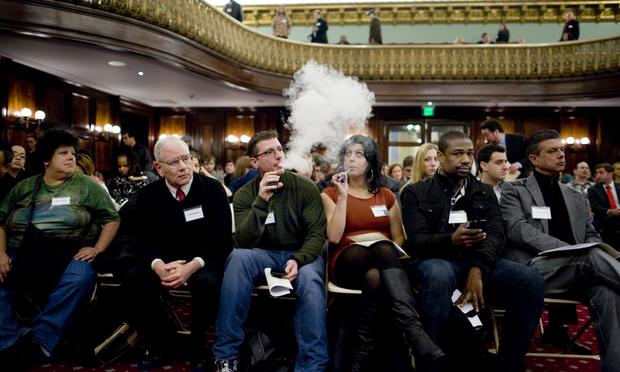 A protestor at New York City Council vapes, before the Council added e-cigarettes to the Indoor Clean Air Act. Some health leaders want to extend that ban to the rest of the state and beyond.