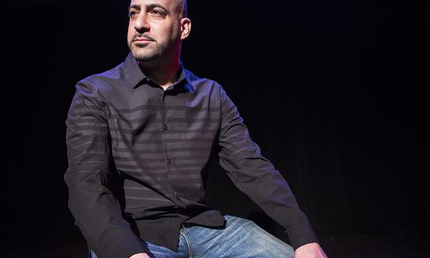 Joe Assadourian in 'The Bullpen,' a one-man comedy that he wrote about his experiences in prison. Joe Assadourian in 'The Bullpen'