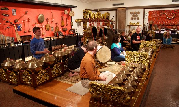 Performers try a selection of instruments from Indonesia on display at the National Music Museum in South Dakota. Performers try a selection of instruments from Indonesia on display at the National Music Museum in South Dakota.