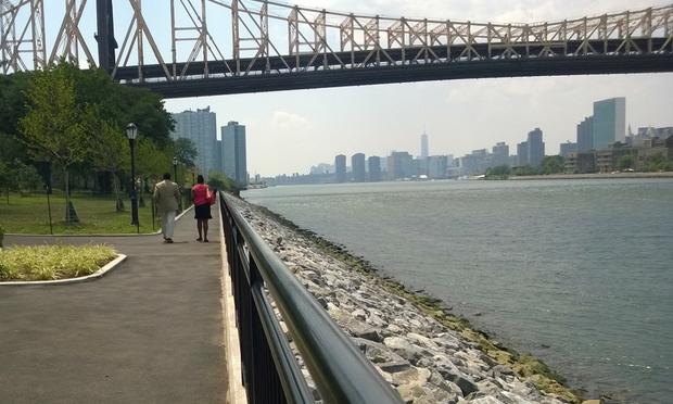 The new promenade in Queensbridge Park has benches and a fishing platform.