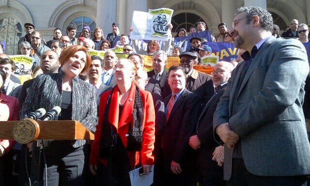 Speaker Quinn announcing a compromise deal on paid sick leave legislation.