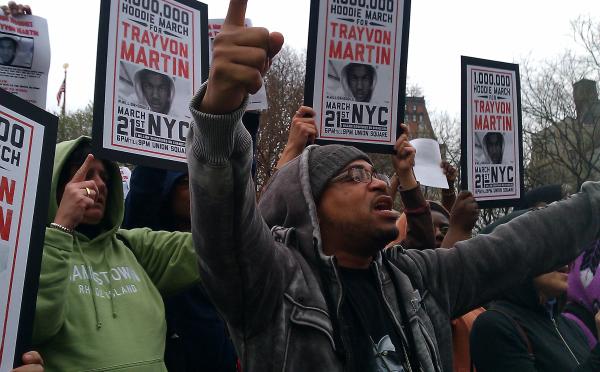 New Yorkers attend a rally in memory of a Trayvon Martin, a black teen who was shot to death by a neighbor in Florida.