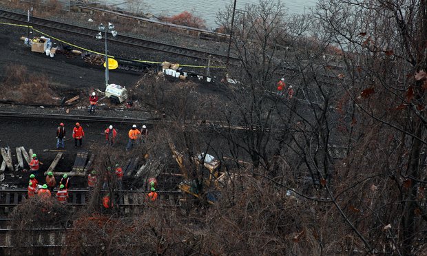 Crews repairing tracks in the Bronx on Tuesday, Dec. 3, 2013, at the site of Sunday's Metro-North fatal train derailment. Crews repairing tracks in the Bronx on Tuesday, Dec. 3, 2013, at the site of Sunday's Metro-North fatal train derailment.