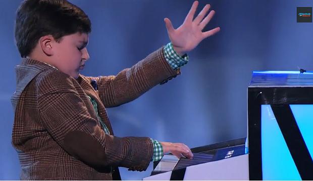 Adrian Romoff performs on 'America's Got Talent' on NBC Adrian Romoff performs on 'America's Got Talent' on NBC