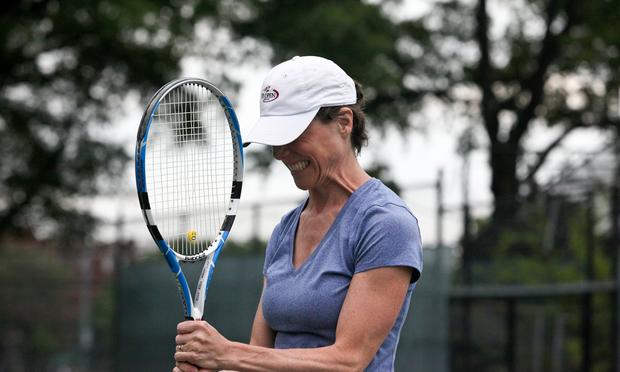 WNYC Host of All Things Considered, Amy Eddings, self described 'New York Tennis Beast' as a shot hits the net.