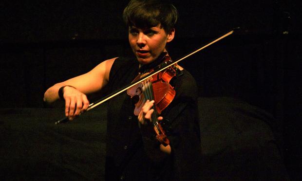 Violinist Sarah Neufeld, a member of Arcade Fire, performs solo in the BAM Rose Cinemas on the first day of the 2013 Crossing Brooklyn Ferry festival.