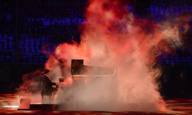 Russian pianist Denis Matsuev performs during the Closing Ceremony of the Sochi Winter Olympics on February 23, 2014 Russian pianist Denis Matsuev performs during the Closing Ceremony of the Sochi Winter Olympics on February 23, 2014