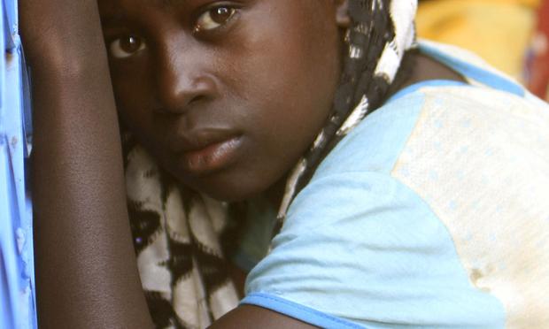 A refugee woman is seen at the refugee camp for the internally displaced in Kalma, home to 80,000 people on the outskirts of Nyala, the capital of South Darfur state on November 8, 2010. A refugee woman is seen at the refugee camp for the internally displaced in Kalma, home to 80,000 people on the outskirts of Nyala, the capital of South Darfur state on November 8, 2010.