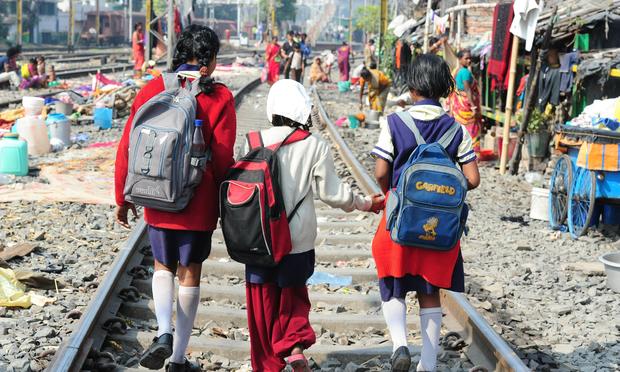 Children in Calcutta, India, walking to school