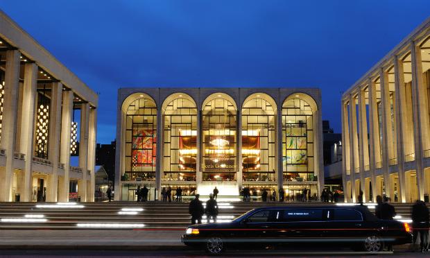 A limo arrives in front of the Metropolitan Opera House A limo arrives in front of the Metropolitan Opera House