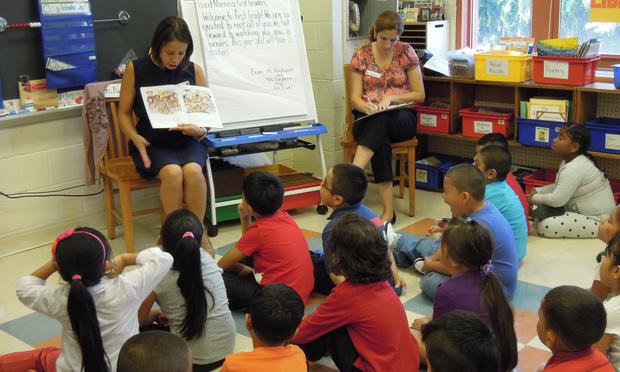 Story time in a first-grade class at P.S. 24 in Brooklyn