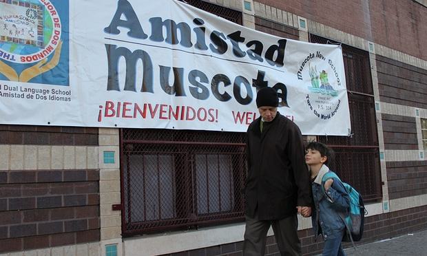 Tony Kelso walks his son Emil to the Amistad Dual Language School in Inwood