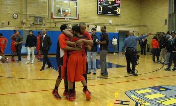 Boys and Girls High School's basketball team members celebrate a hard-fought win against Transit Tech in 2013.