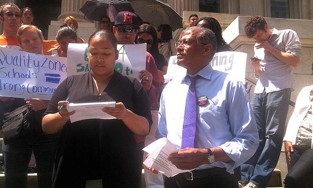 City Councilman Robert Jackson (right) with residents of Upper Manhattan who oppose de-zoning District 6, which includes Washington Heights and Inwood.