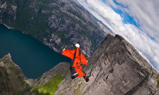 A B.A.S.E. jumper in wingsuit jumps off a cliff August 21, 2010, in Kjerag, Norway. Wingsuit cliff jumping is an advanced discipline, it makes human flight possible. A B.A.S.E. jumper in wingsuit jumps off a cliff August 21, 2010, in Kjerag, Norway. Wingsuit cliff jumping is an advanced discipline, it makes human flight possible.