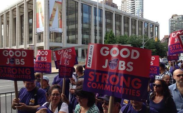 Members of the service workers' union 32BJ gathered outside Lincoln Center to protest proposed benefit cuts Members of the service workers' union 32BJ gathered outside Lincoln Center Thursday to protest proposed benefit cuts
