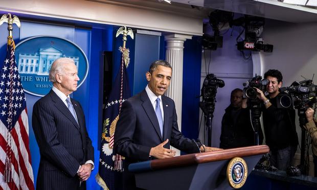 President Obama makes a statement alongside Vice President Biden.