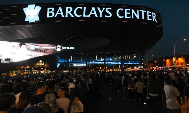 Lines stretch down the block on opening night of the Barclays Center. Lines stretch down the block on opening night of the Barclays Center.