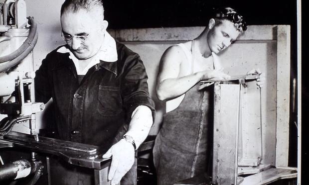 Charles Bliss working in a factory