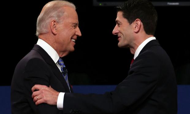 U.S. Vice President Joe Biden (L) shakes hands with Republican vice presidential candidate U.S. Rep. Paul Ryan (R-WI) (R) during the vice presidential debate. U.S. Vice President Joe Biden (L) shakes hands with Republican vice presidential candidate U.S. Rep. Paul Ryan (R-WI) (R) during the vice presidential debate.