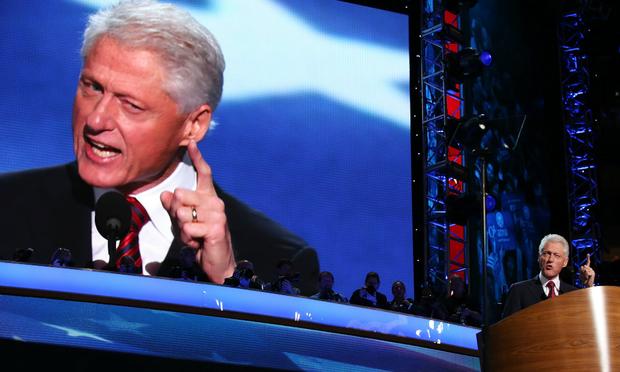 Former U.S. President Bill Clinton speaks on stage during day two of the Democratic National Convention.