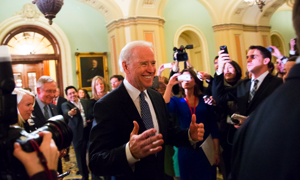 Vice President Joe Biden urged Senate Democrats to support a tentative tax agreement with Republicans in a closed-door meeting. joe biden, fiscal cliff, mitch mcconnell