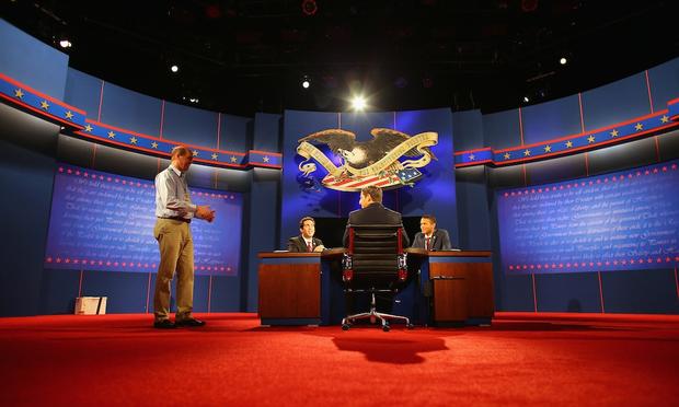 Stand-ins participate in a stage rehearsal a day ahead of the final presidential debate in Boca Raton. obama, romney, debate, boca raton
