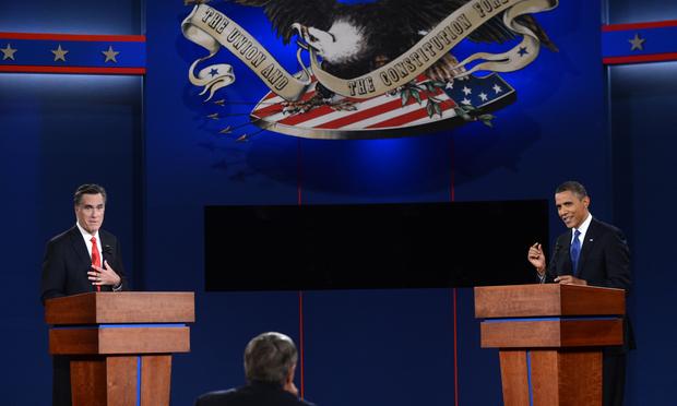 US President Barack Obama (R) and Republican presidential candidate Mitt Romney (L) participate in the first presidential debate at Magness Arena at the University of Denver in Denver, Colorado.