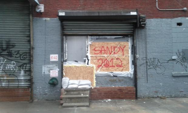 A sign for Sandy along 9th street near the Gowanus Canal Monday afternoon.