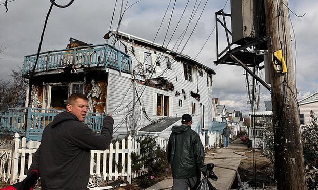 Residents return to destroyed homes in Rockaway, Queens.