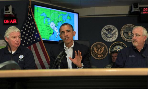 U.S. President Barack Obama makes a statement after a briefing on Hurricane Sandy with Richard Serino (L), Deputy Administrator, FEMA, and Craig Fugate (R), Administrator FEMA at FEMA Headquarters.
