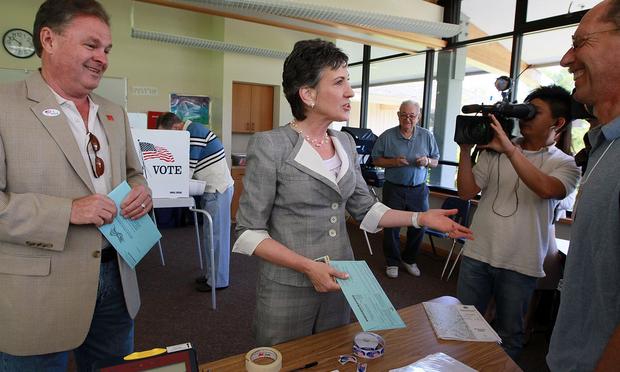 Republican candidate for U.S. Senate and former HP CEO Carly Fiorina greets poll workers before voting June 8, 2010 in Los Altos Hills, California.